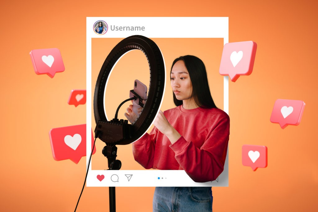 Imagem representando o feed da plataforma instagram com um fundo laranja atrás e uma mulher de cabelos lisos que mexe ao celular.